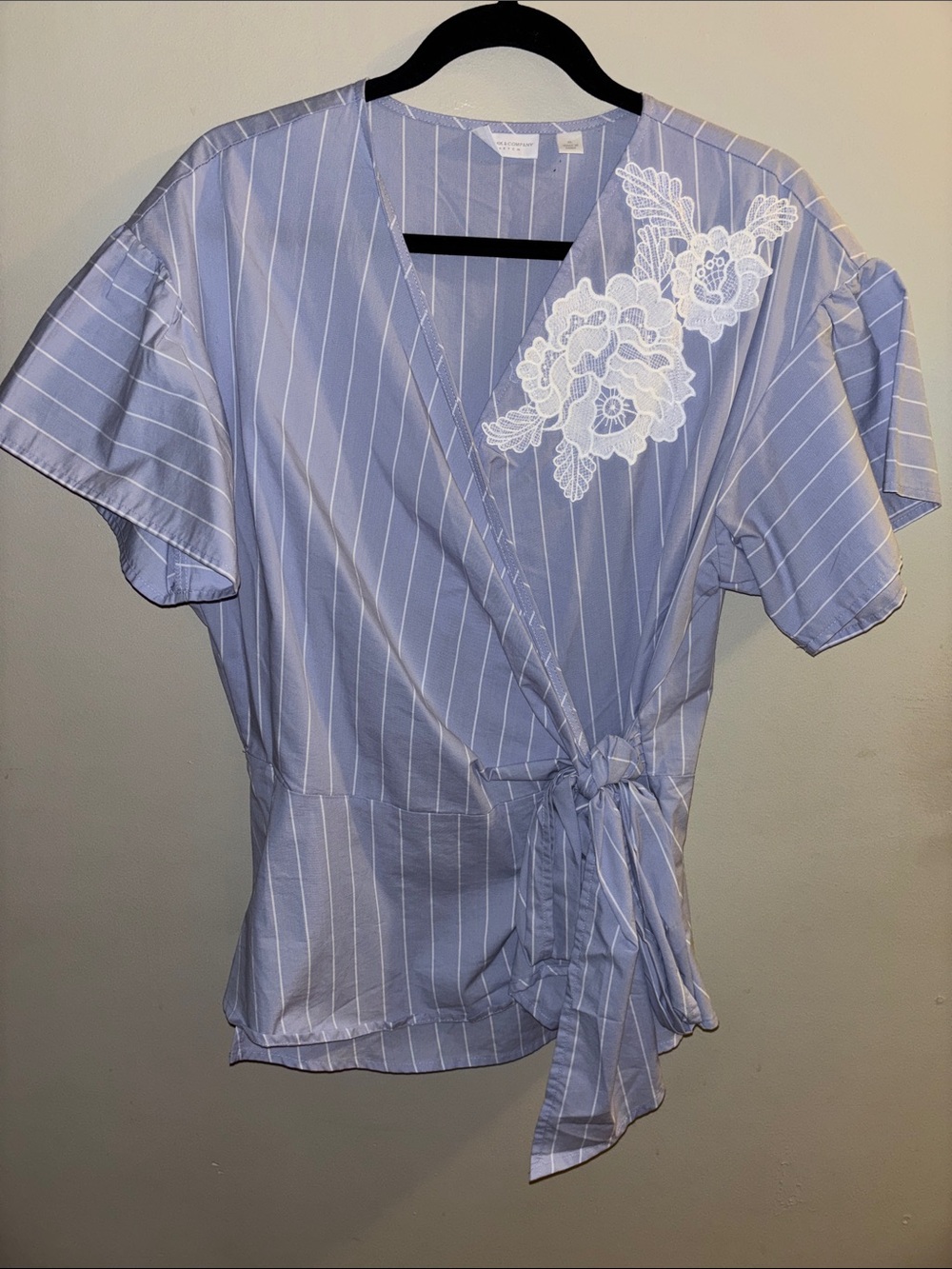 New York & Company Light Blue Striped Wrap Top with White Applique, feels linen